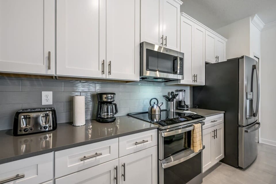 Villa (4 Bedrooms) | Private kitchen | Microwave, oven, highchair, blender