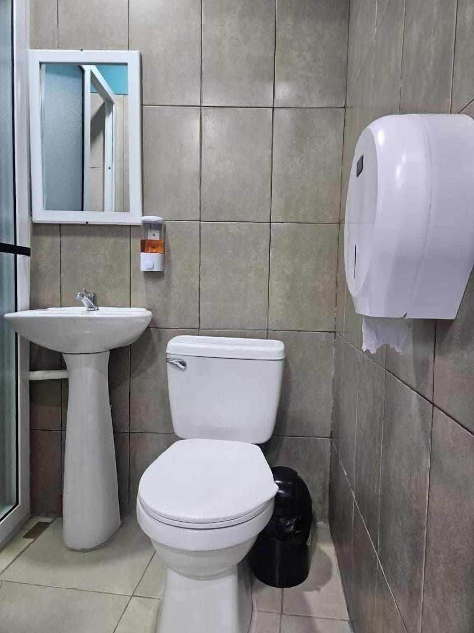 Shower, free toiletries, towels, soap