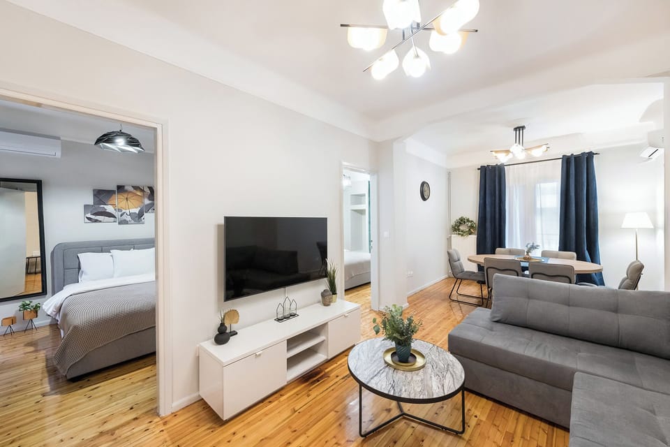 Apartment, 3 Bedrooms | Living area | Flat-screen TV