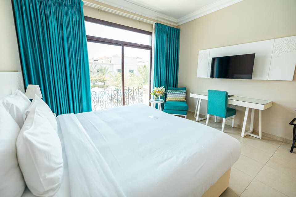 Three Bedroom Garden Pool view  | In-room safe, laptop workspace, free WiFi, bed sheets