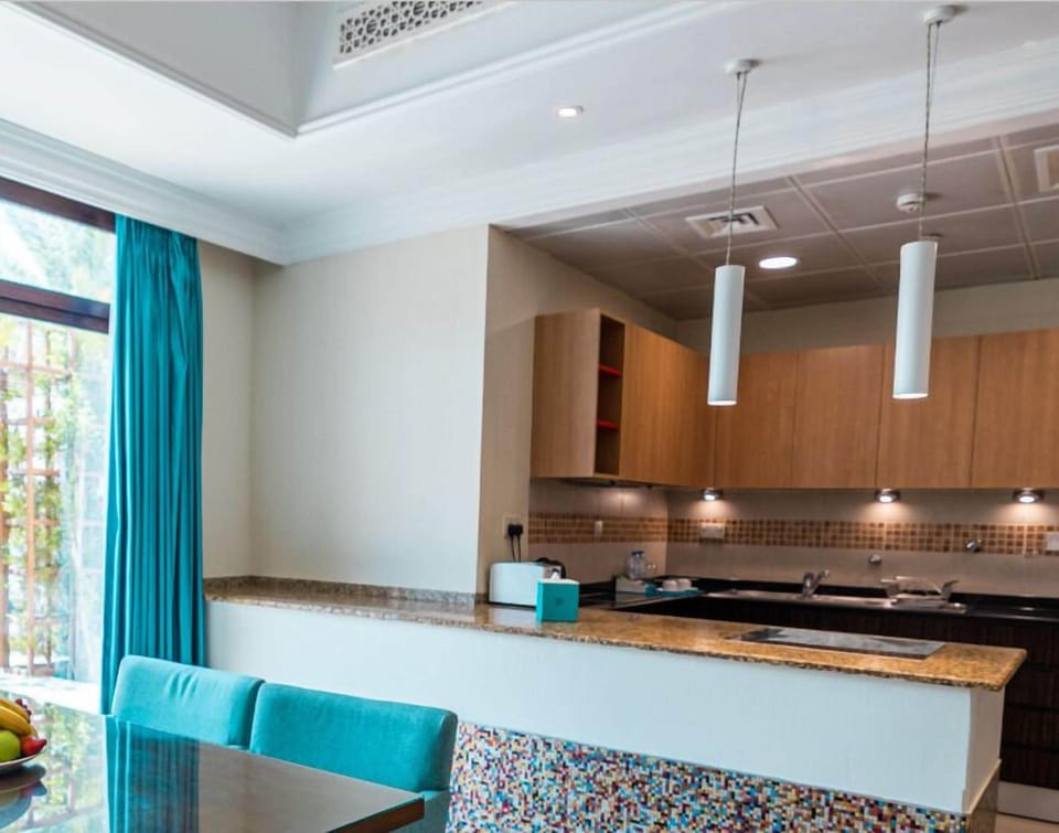 Two Bedroom | Living area | 48-inch LED TV with satellite channels, TV