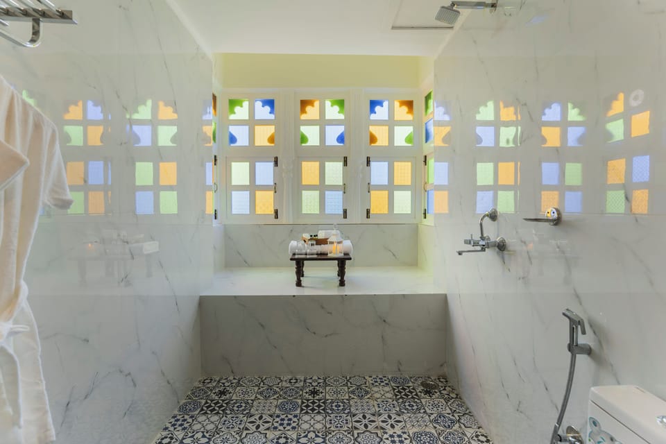 Premier Suite, Balcony, Garden View | Bathroom | Combined shower/tub, free toiletries, hair dryer, slippers
