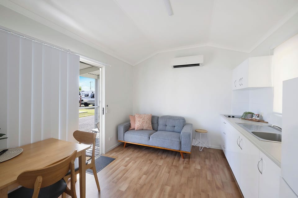 Deluxe Cabin - Sleeps 2 - Dog Friendly | Living area | 32-inch TV with cable channels