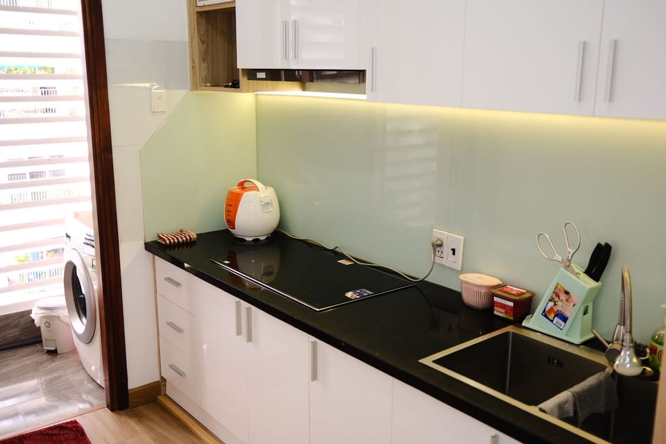 Standard Apartment, Balcony, Mountain View | Private kitchen | Cleaning supplies