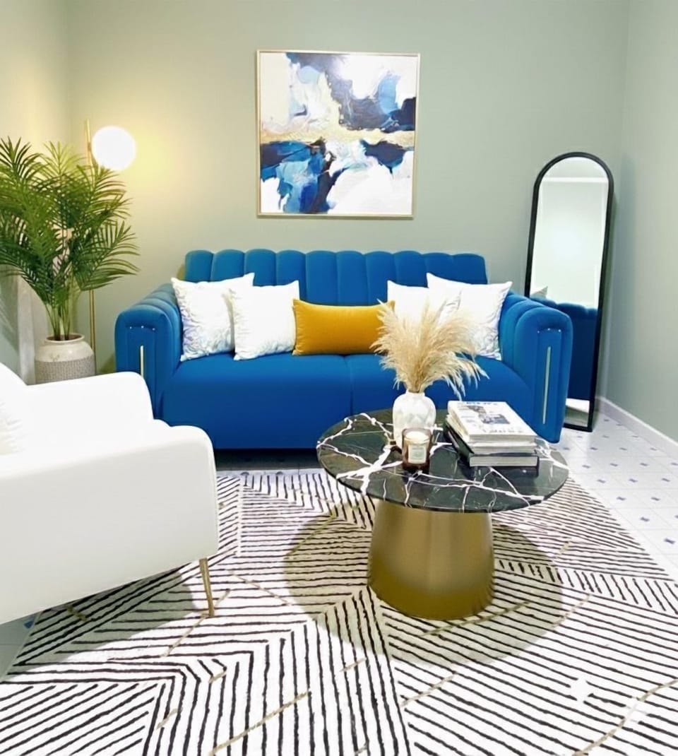 Deluxe Apartment | Living area | 32-inch Smart TV with digital channels