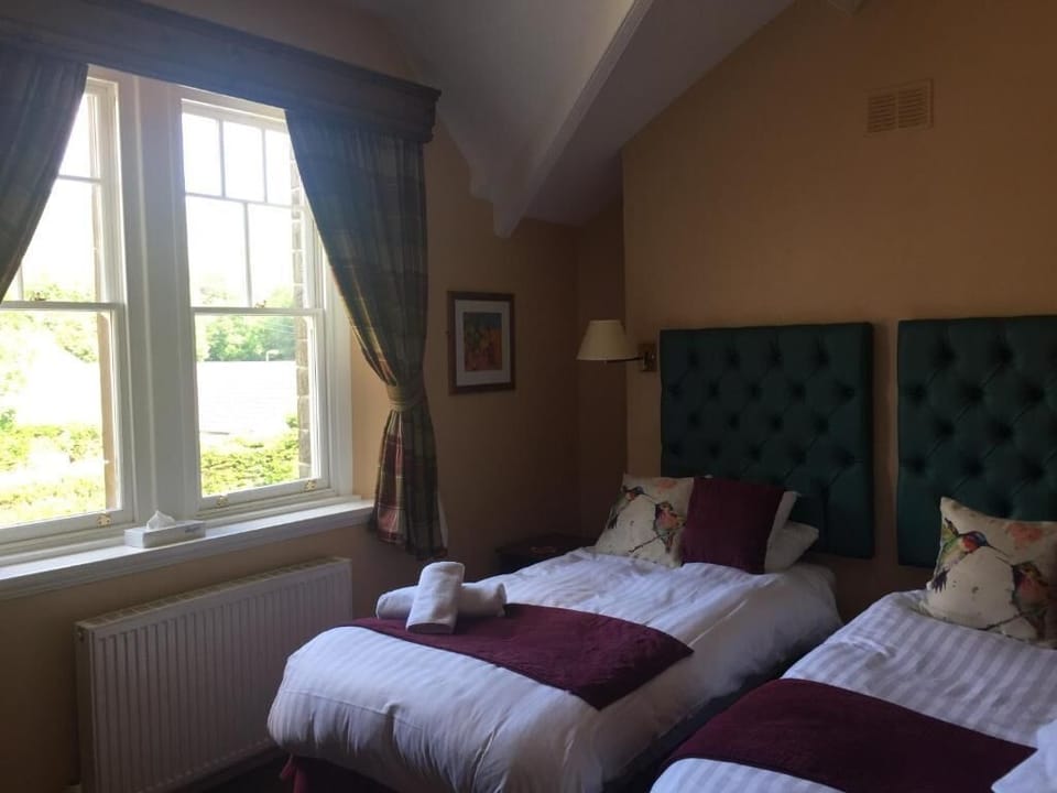 Standard Twin Room, Mountain View | Desk, blackout drapes, iron/ironing board, free WiFi