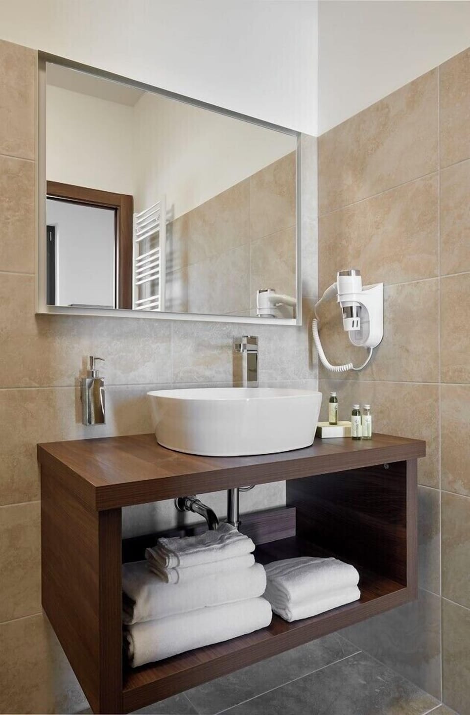 Shower, hair dryer, slippers, towels