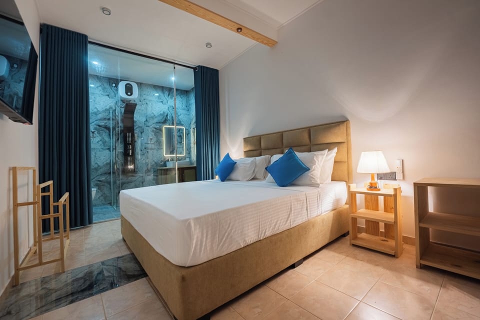 Deluxe Apartment, Balcony, Pool View | Iron/ironing board, free WiFi, bed sheets
