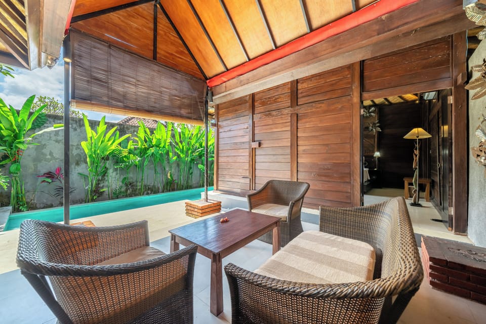 Deluxe Villa, Balcony | Living area | Flat-screen TV