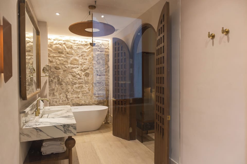Premium Room, 2 Queen Beds | Bathroom | Hair dryer, towels, soap, shampoo
