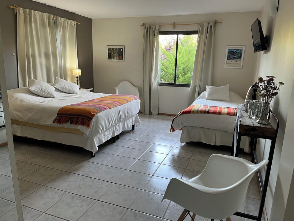 Superior Triple Room, Garden View | In-room safe, laptop workspace, WiFi (free), bed sheets