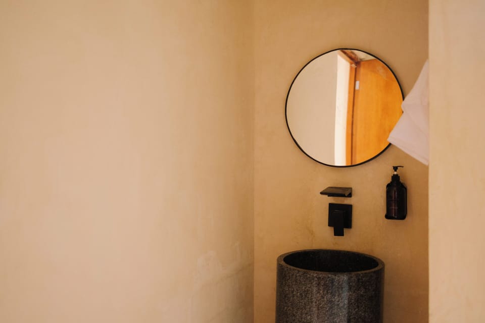 Superior Suite, Balcony, Pool View | Bathroom | Hair dryer, towels, soap, shampoo