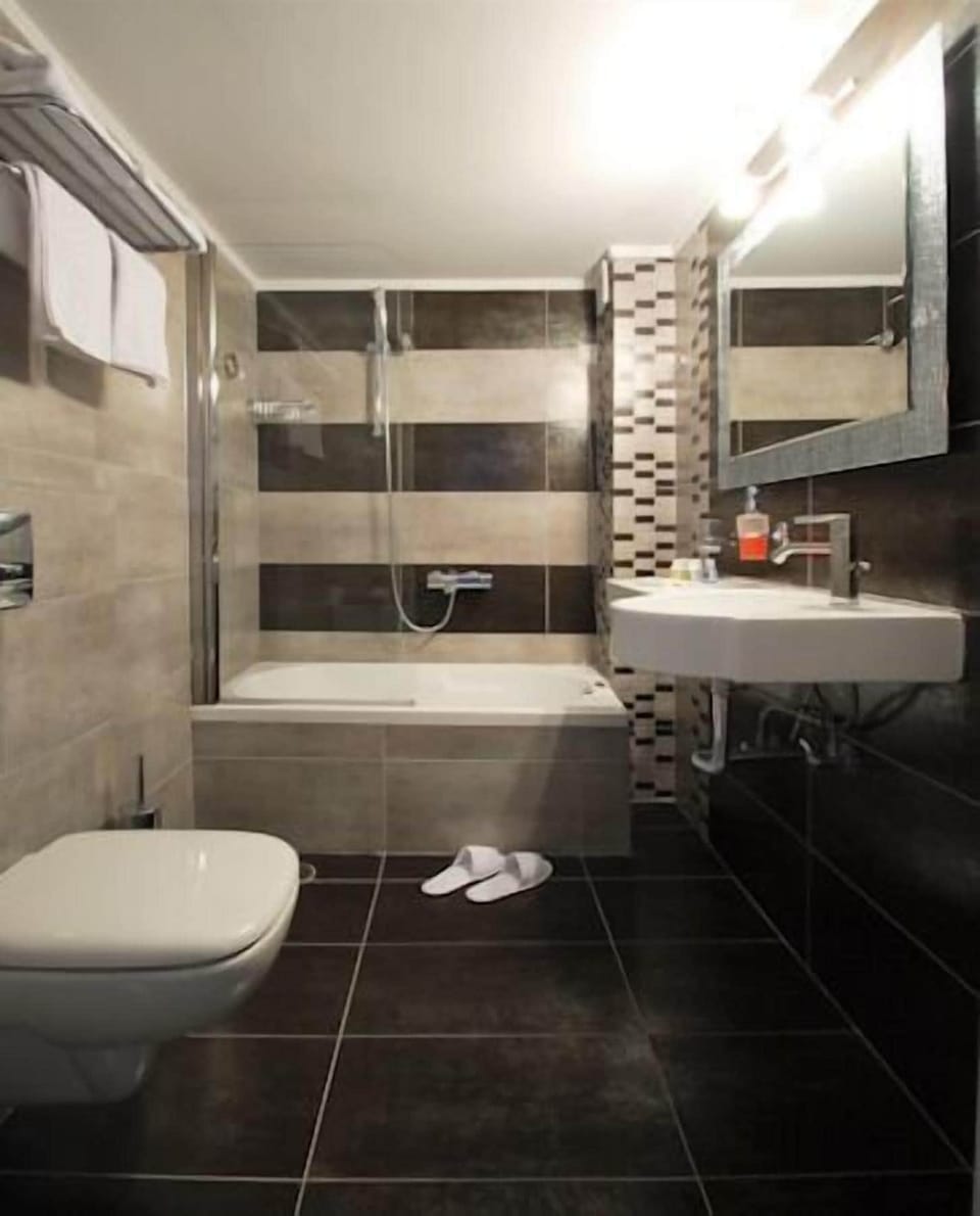 Family Room, Sea View | Bathroom | Hair dryer, bathrobes, slippers, towels