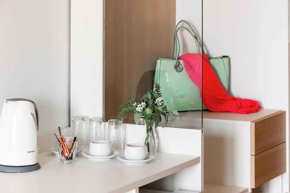 Design Double or Twin Room, Non Smoking, City View | Living area | 32-inch flat-screen TV with digital channels, TV