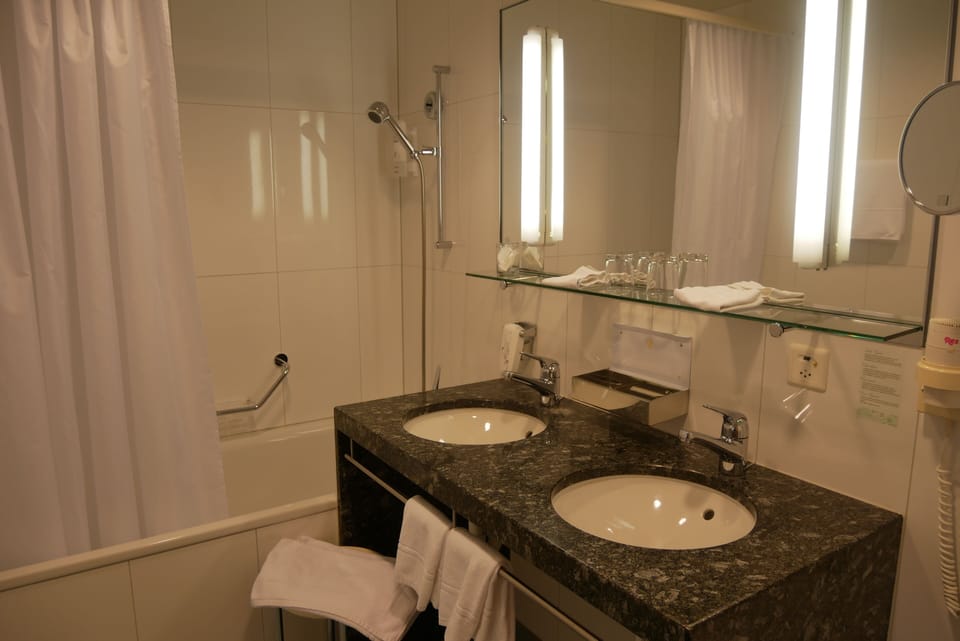 Hair dryer, slippers, towels, soap