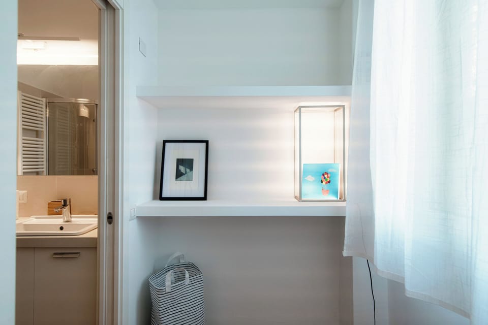 Apartment, Lake View | Bathroom | Separate tub and shower, free toiletries, hair dryer, bidet