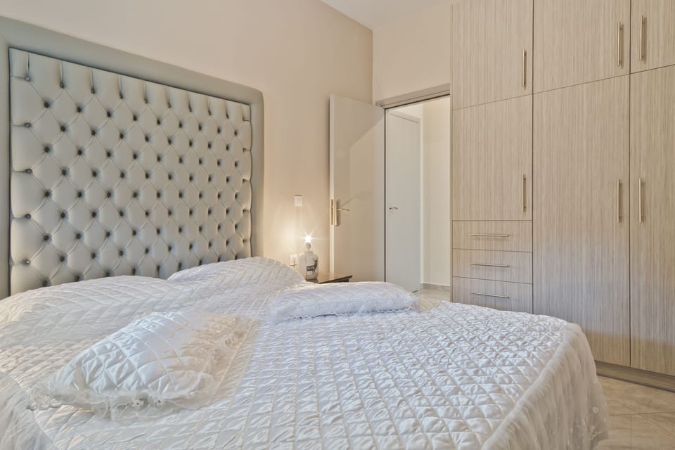 Luxury Apartment, Sea View, Ground Floor (Village View) | Iron/ironing board, cribs/infant beds, free WiFi, bed sheets