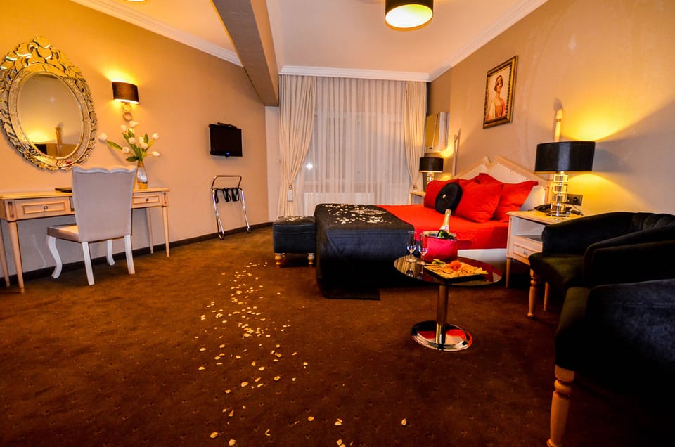 Suite, Jetted Tub | Premium bedding, free minibar items, in-room safe, soundproofing