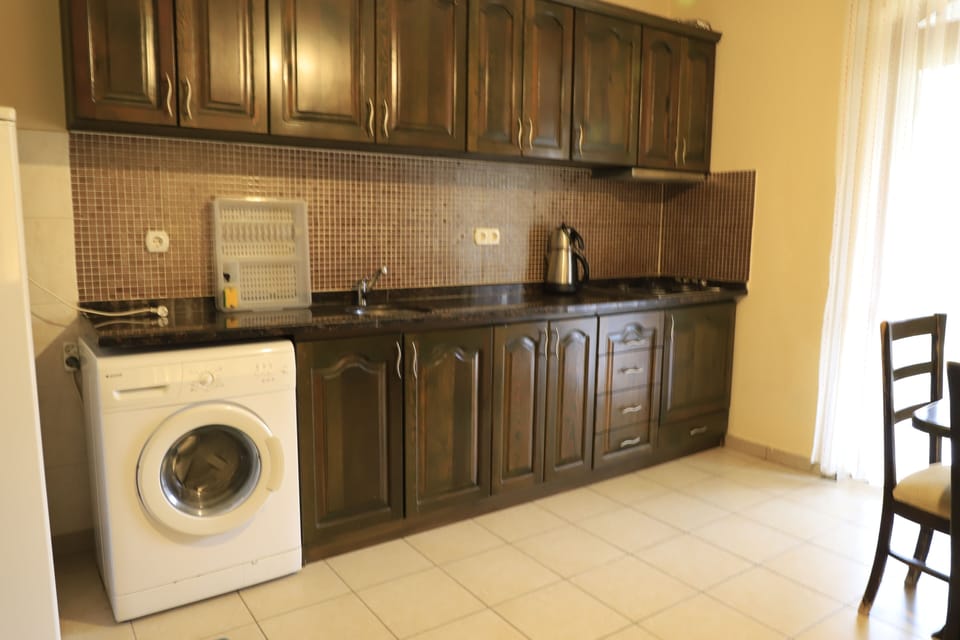Apartment, 2 Bedrooms | Private kitchen | Stovetop, electric kettle, cookware/dishes/utensils