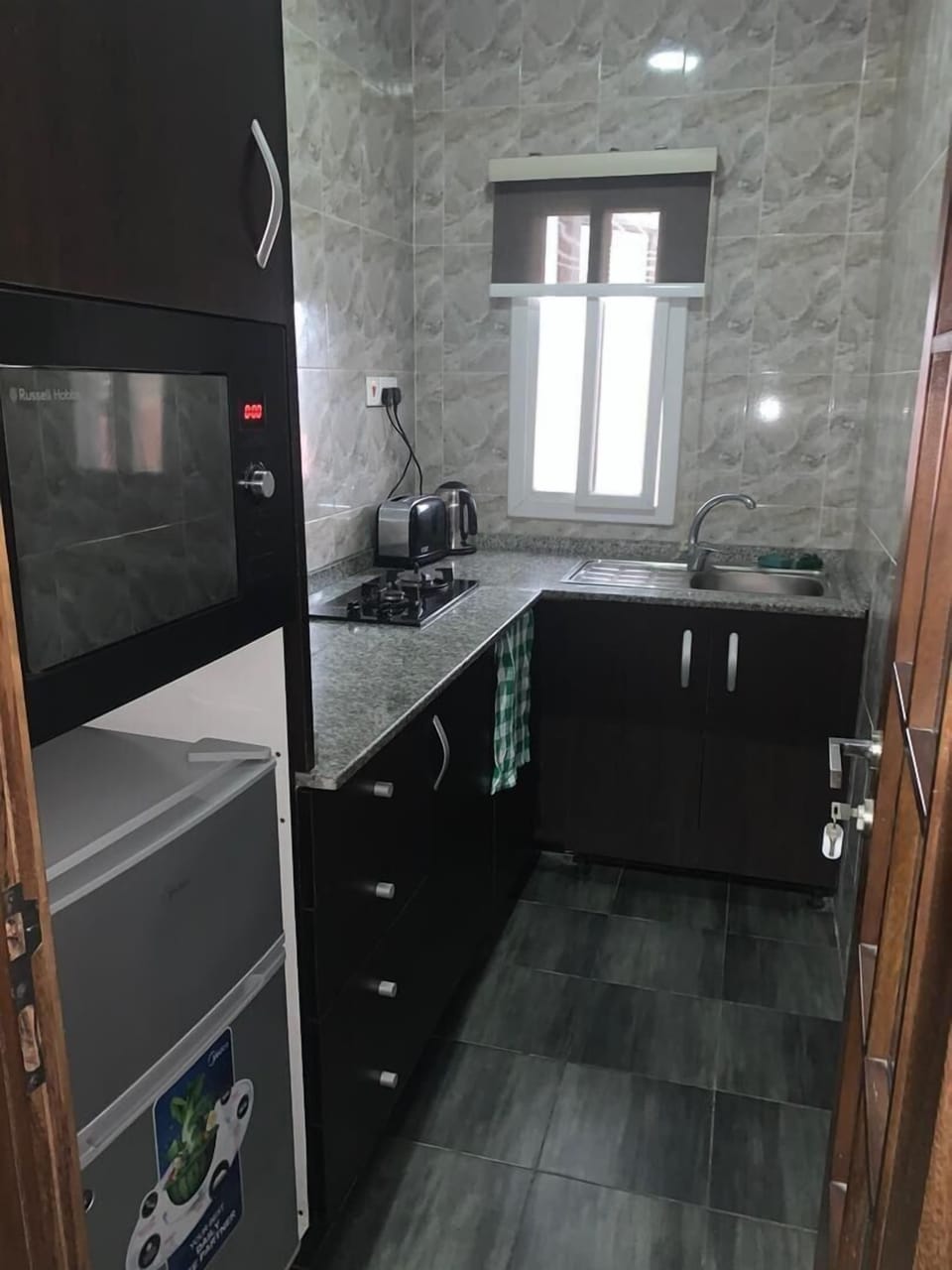 Classic Apartment, Patio, City View | Private kitchen | Mini-fridge, microwave, cookware/dishes/utensils