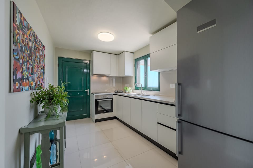 Apartment, 1 Bedroom, Smoking, Pool Access | Private kitchen | Coffee/tea maker, highchair