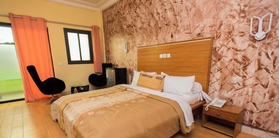 Standard Double Room, Air conditioning, Executive Level | Blackout drapes, iron/ironing board, free WiFi