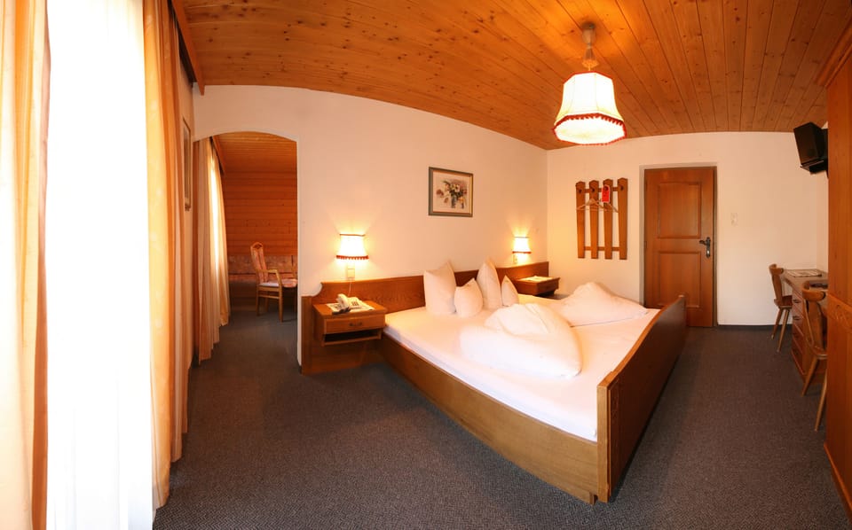 Triple Room, Balcony, Mountain View | In-room safe, desk, free WiFi, bed sheets