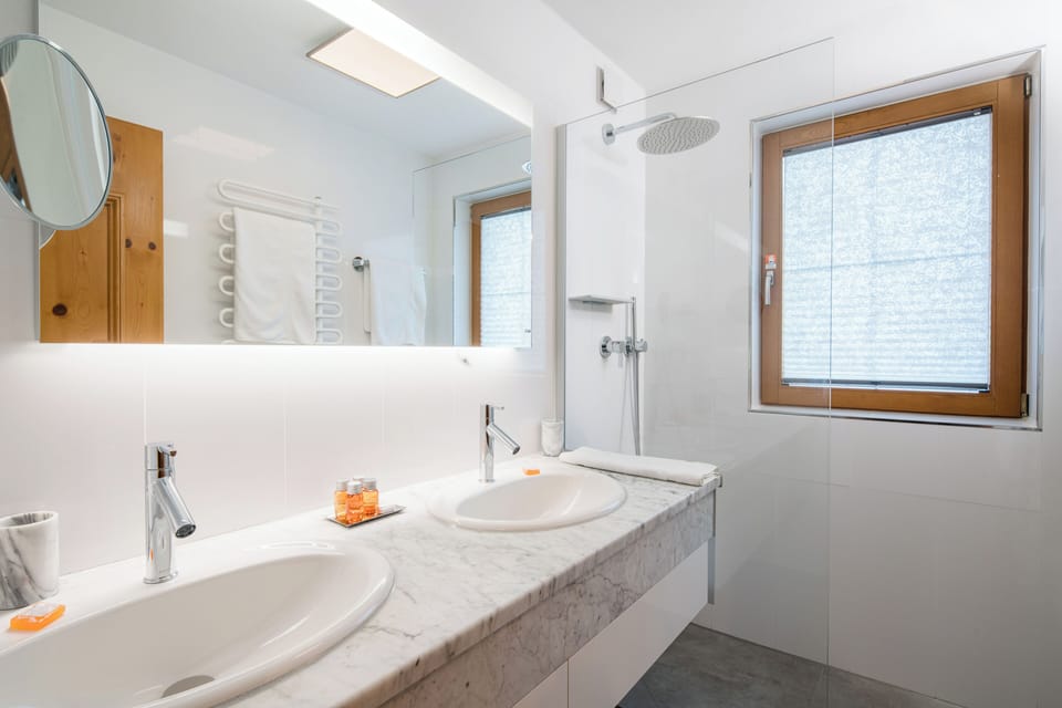 Shower, free toiletries, hair dryer, slippers