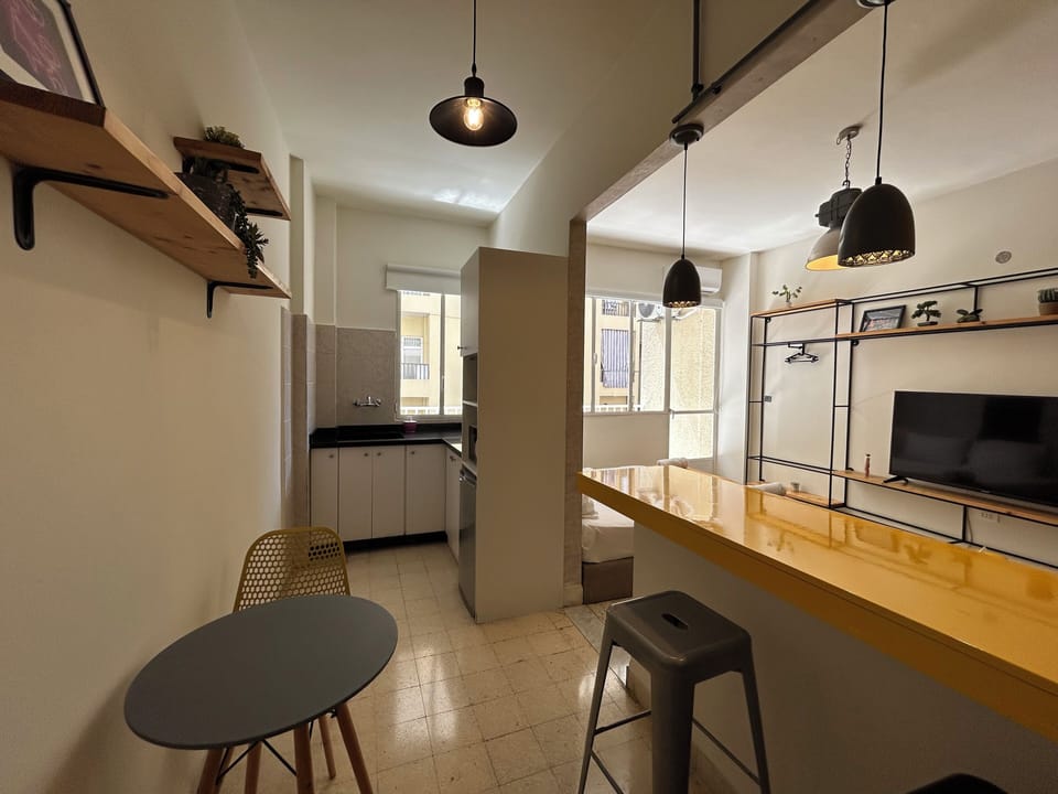 Studio, 1 Double Bed, Balcony, City View | In-room dining