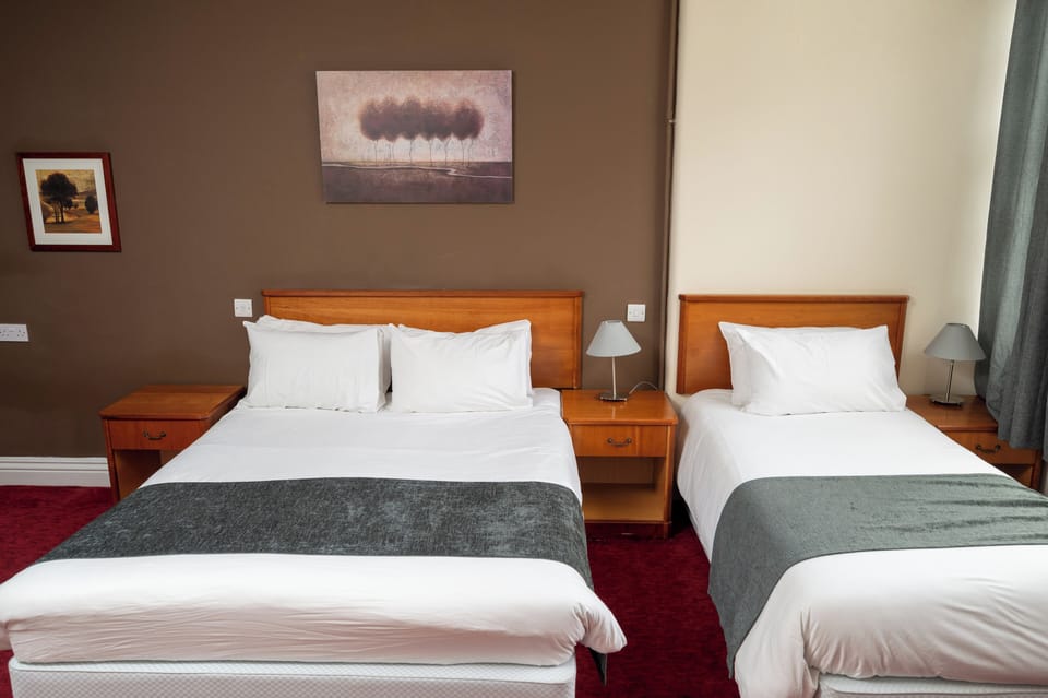 Family Room | Desk, iron/ironing board, free WiFi, bed sheets