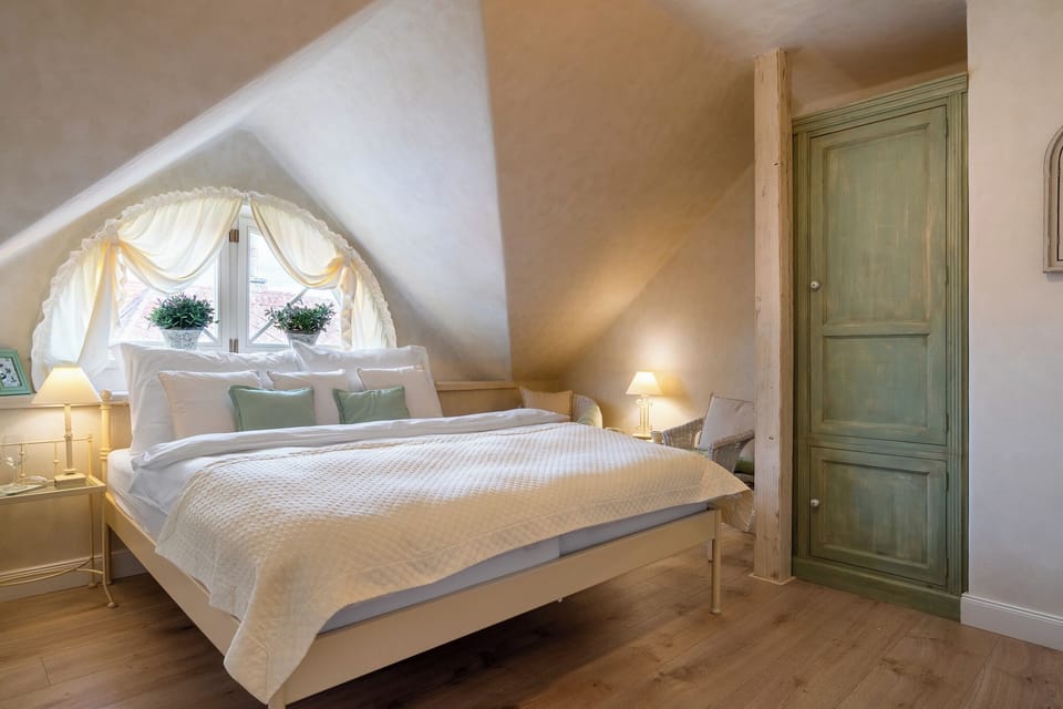 Family Room, City View | Minibar, in-room safe, individually decorated, soundproofing