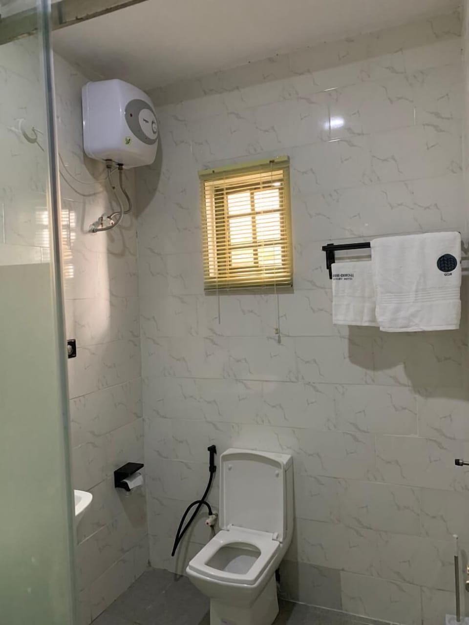 Deluxe Single Room | Bathroom | Shower, bathrobes, towels, soap