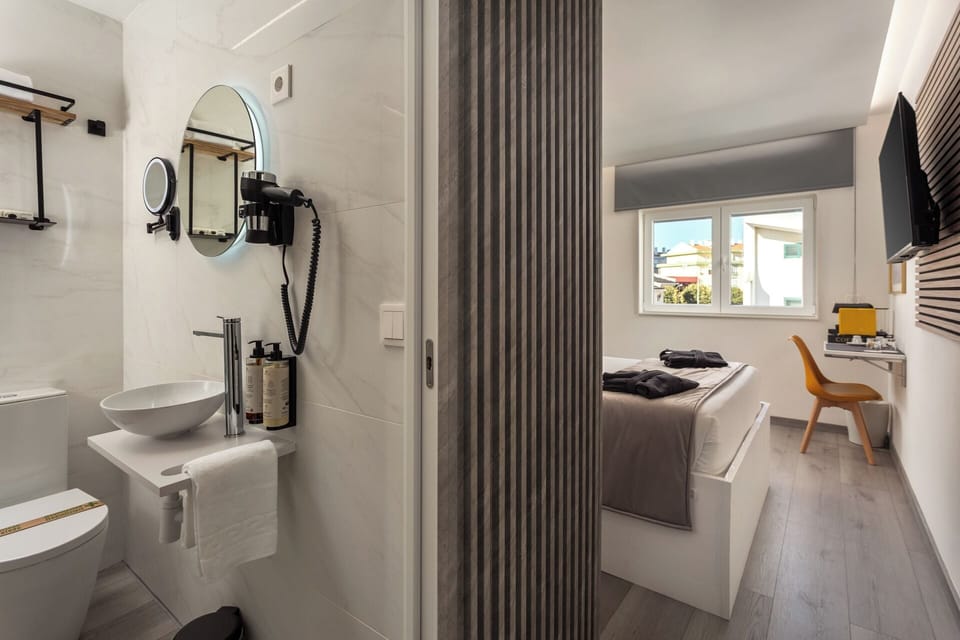 Deluxe Double Room, Private Bathroom, Pool View | Bathroom | Shower, designer toiletries, hair dryer, bathrobes