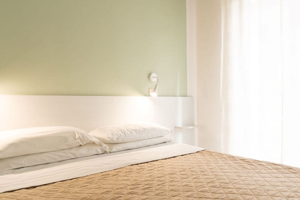 Deluxe Double or Twin Room, Balcony | In-room safe, desk, free WiFi