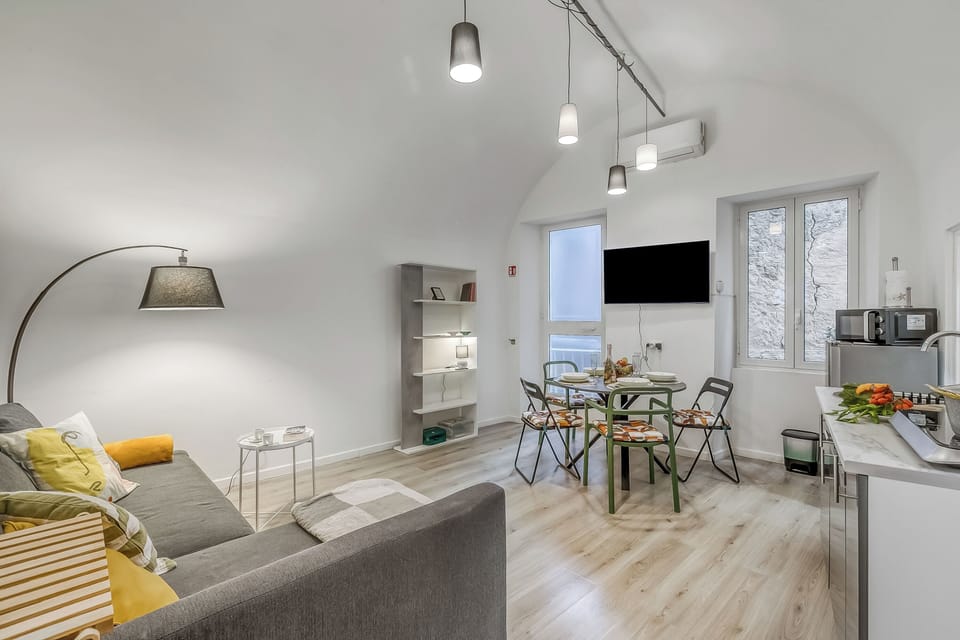 Standard Apartment, 1 Bedroom, Microwave (Casa di Lilo) | Living area | 21-inch TV with cable channels