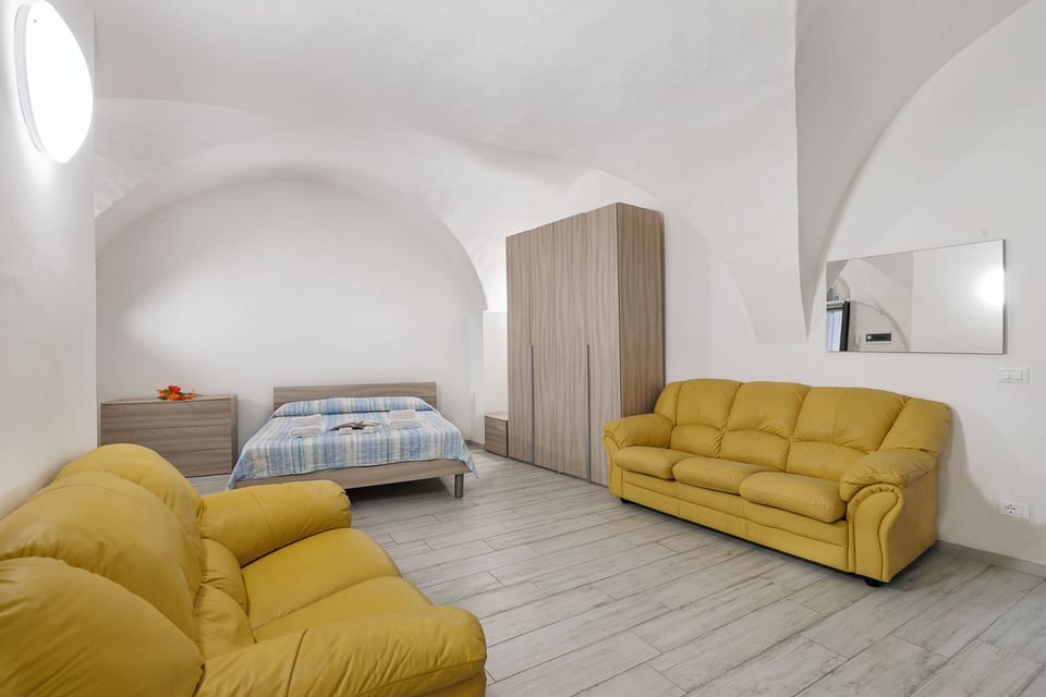 Family Apartment, Multiple Bedrooms, Sea Facing (Solemare - Ceriale Center & Parking) | Living area | 21-inch Smart TV with cable channels
