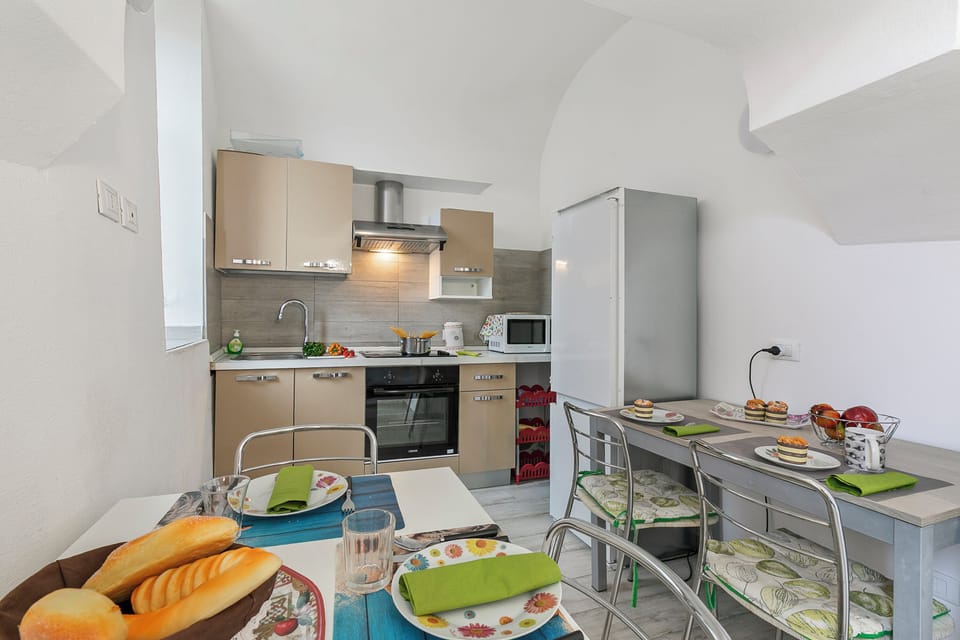 Family Apartment, Multiple Bedrooms, Sea Facing (Solemare - Ceriale Center & Parking) | Private kitchen | Fridge, oven, stovetop, cookware/dishes/utensils