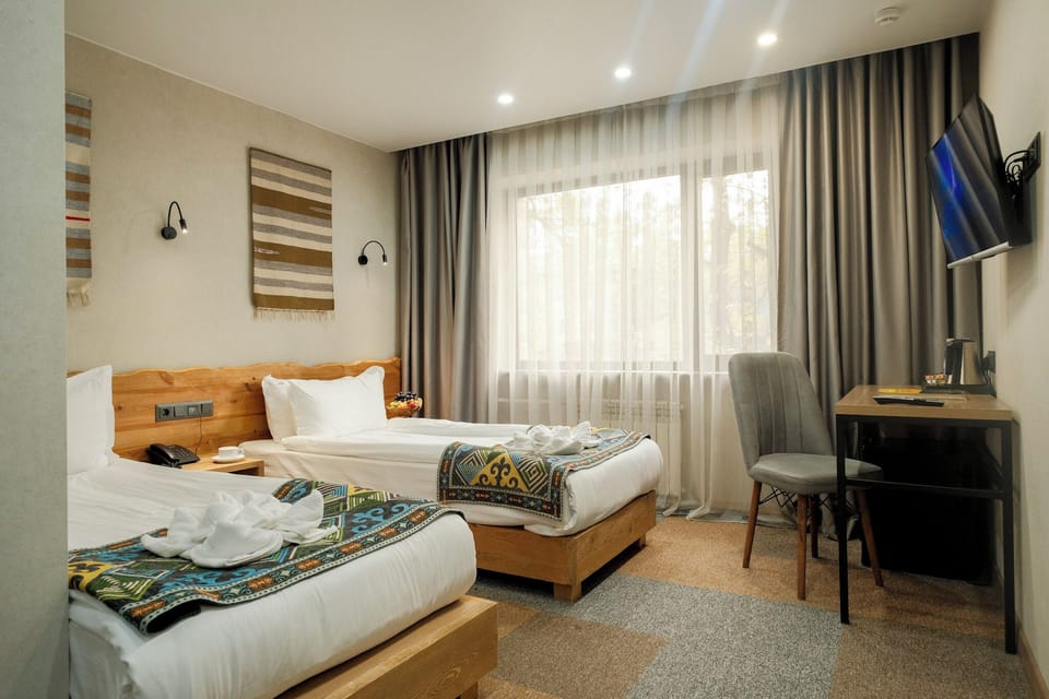 Standard Twin Room, City View | In-room safe, blackout drapes, iron/ironing board, WiFi (free)