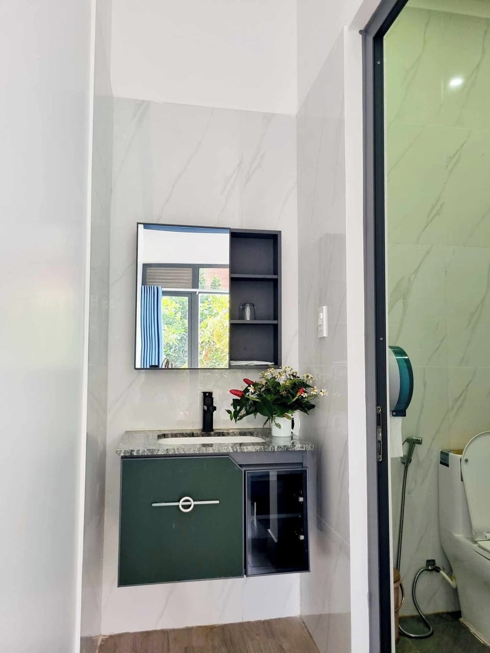 Shower, free toiletries, hair dryer, slippers
