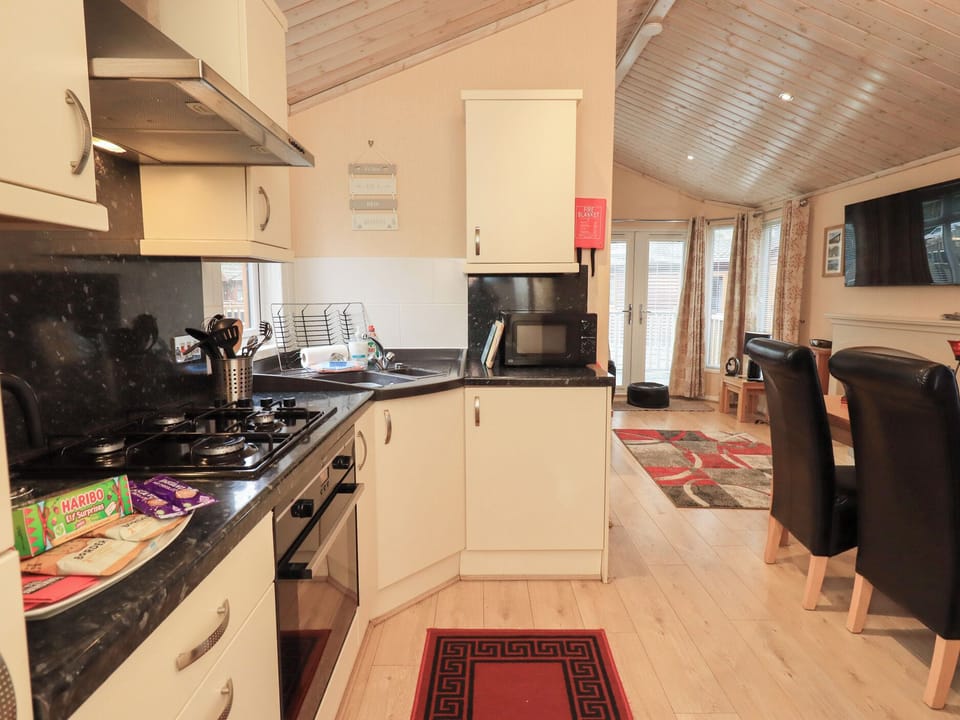 Fridge, microwave, cookware/dishes/utensils
