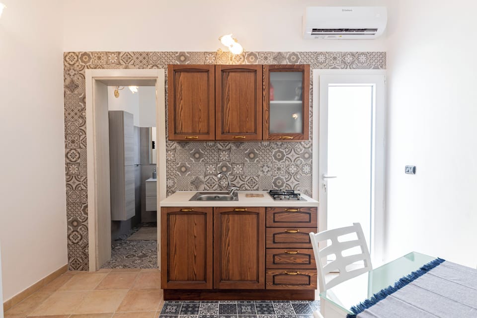Fridge, stovetop, cookware/dishes/utensils