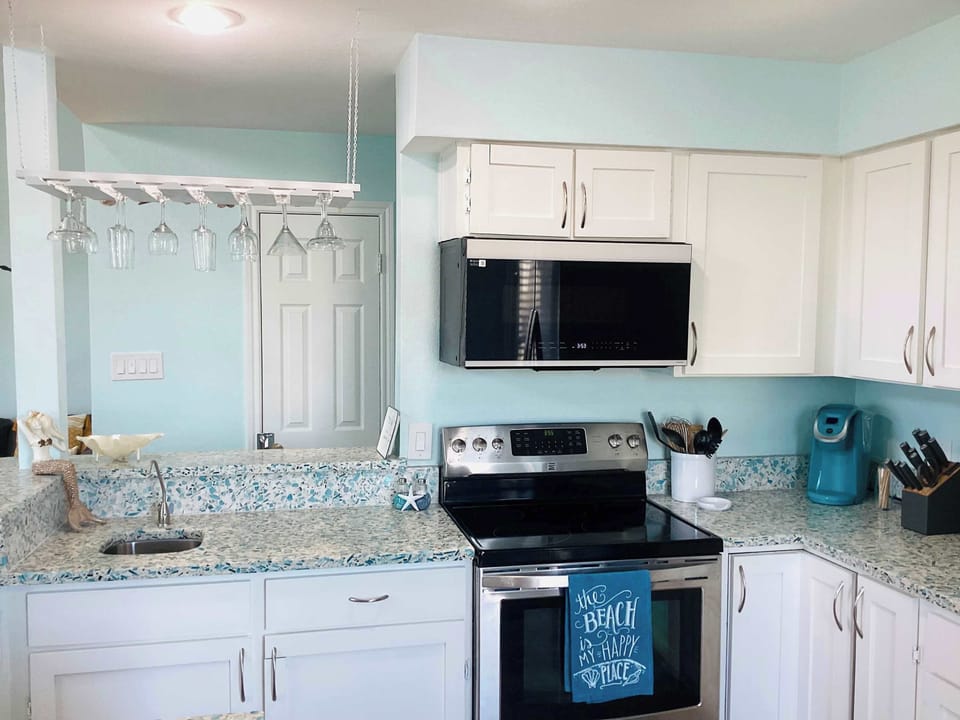 Townhome, Multiple Beds, Patio (Saltwater Solace) | Private kitchen | Dining table