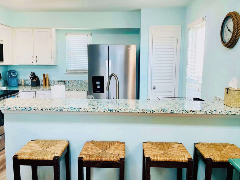 Townhome, Multiple Beds, Patio (Saltwater Solace) | Private kitchen | Dining table