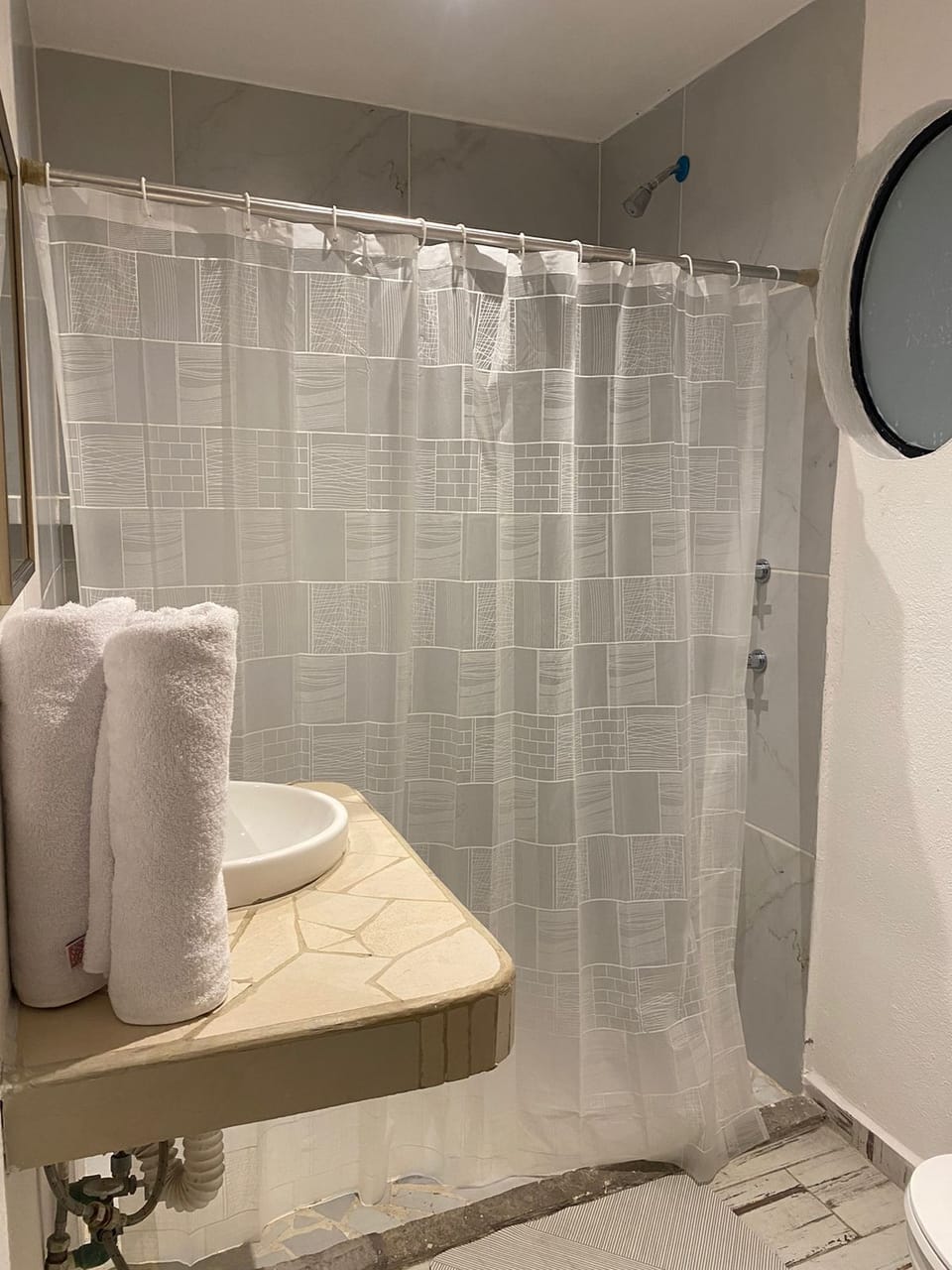 Grand Studio Suite, Balcony, City View | Bathroom | Shower, hair dryer, towels