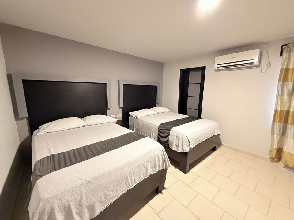 Basic Double Room, Private Bathroom | Minibar (some free items), WiFi (free), bed sheets