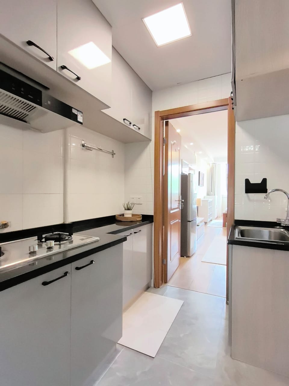 Standard Studio Suite, City View | Private kitchen | Fridge, microwave, stovetop, cleaning supplies