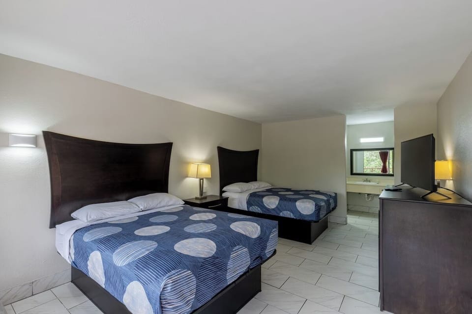 Room, 2 Queen Beds, Non Smoking | Desk, iron/ironing board, free WiFi, bed sheets