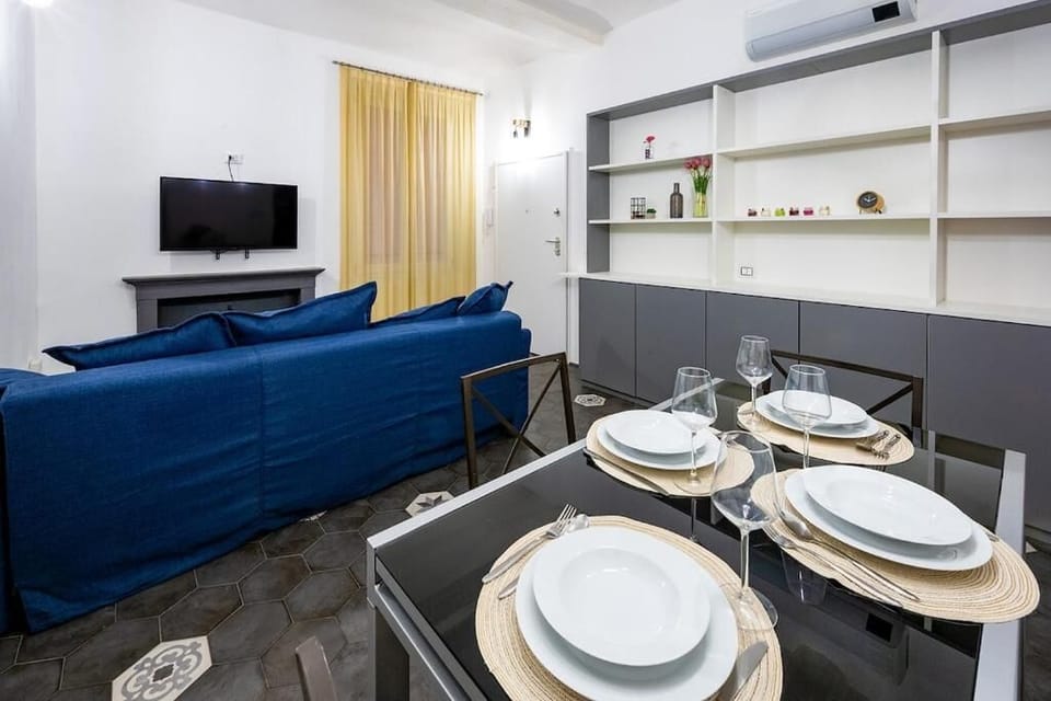 Comfort Apartment | Living area | Flat-screen TV