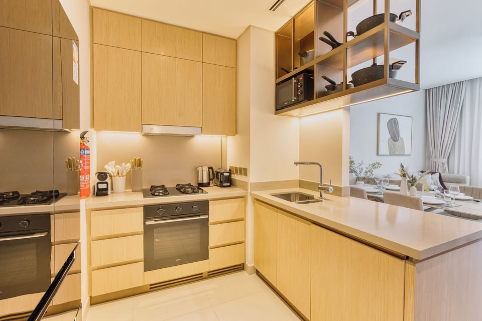 Luxury Apartment, Multiple Beds, City View | Private kitchen | Full-size fridge, microwave, oven, stovetop