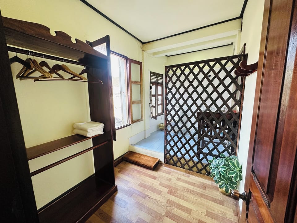 Superior Triple Room, City View | Bathroom | Shower, hair dryer, slippers, towels
